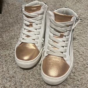 Rose gold and white high top tennis shoes